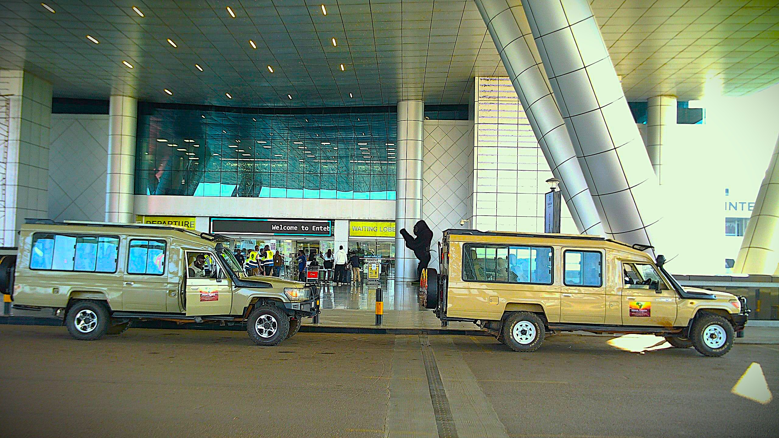 MISSK Africa Safaris team and fleet at the airport
